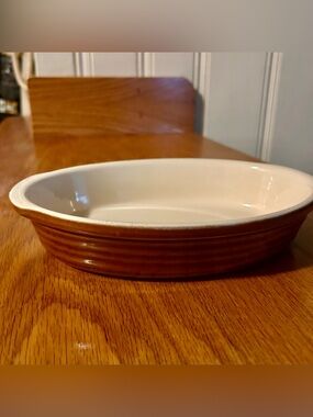 Emile Henry France caramel brown ribbed 6 1/2” W x 9 1/2”L oval baking dish
